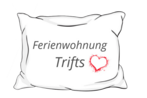 Logo unserer Ferienwohnung Trifts: Herz auf Kissen