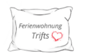 Logo unserer Ferienwohnung Trifts: Herz auf Kissen